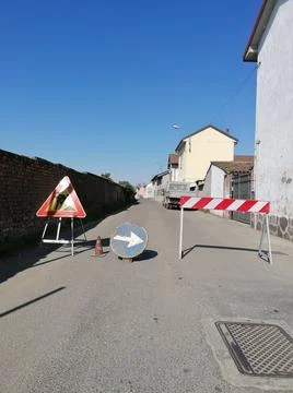 Road signs of work in progress and obligation of detours Stock Photos