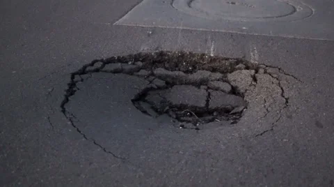 Road Sinkhole Handheld Closeup Stock Footage 58159846