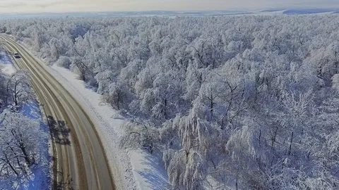 Road in the snowy forest Stock Footage 85833126