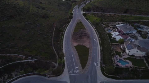 Road splits around live oak tree in Simi Valley, CA Stock Footage 271698028