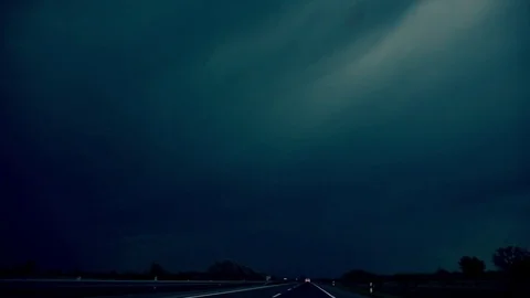 On the road to the storm, lightning in the dark sky Stock Footage 75831812