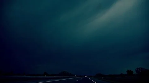 On the road to the storm, lightning in the dark sky Stock Footage 75836289