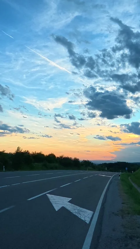 Road stretches beneath a twilight sky. Mount Rtanj Area. Vertical Stock Footage 340899123