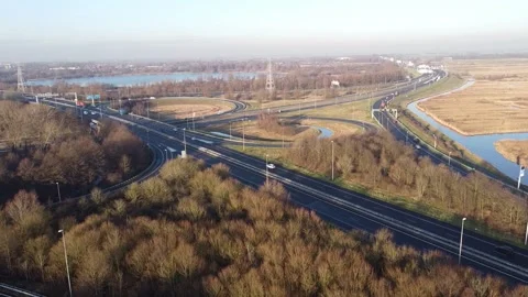 Road structure seen from above, entrances and exits in the shape of cloverleaf. 動画素材 168456672