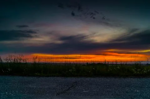 Road at sunset Stock Photos