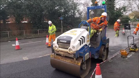 Road Surfacing, Asphalt Machine Roller, Paving roller machine on paving works Stock Footage 147286002