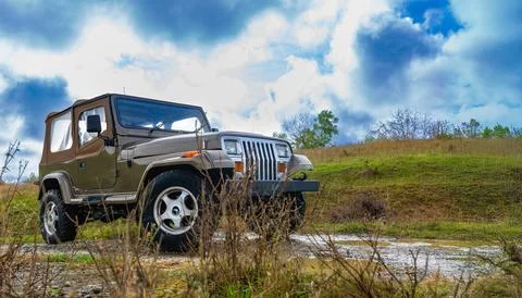 Off-Road SUV in Scenic Landscape Stock Photos
