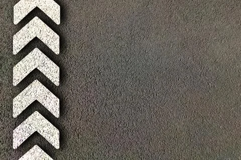 Road texture background with arrows of danger side movement Stock Photos