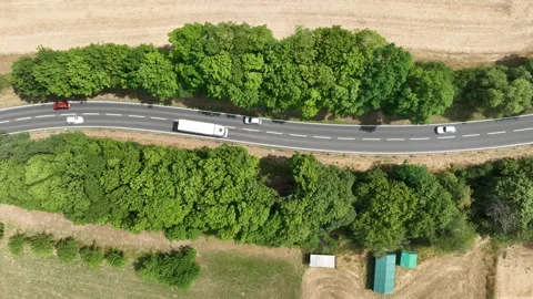 Road through agricultural fields Stock Footage 340149760