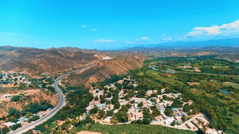 A road through the American mountain range on a sunny summer morning. Stock Footage 310320868