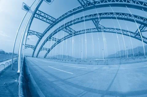 Road through the bridge Stock Photos