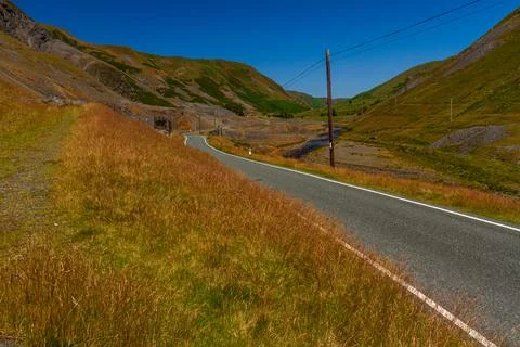 Road through Cwmystwyth, the centre point of wales. Stock Photos