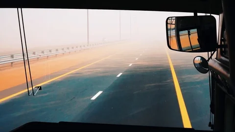 Road through the desert in the sandstorm. Stock Footage 87988480