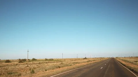 Road through desert steppe Stock Footage 65258840