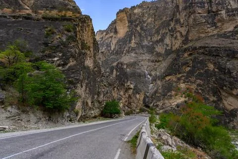 Road through a Dramatic Mountain Canyon Stock Photos