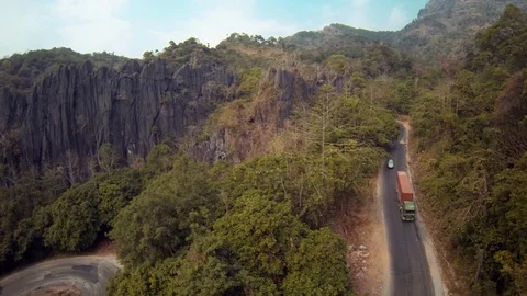 Road Through Dramatic Mountains in Laos Stock Footage 74202727