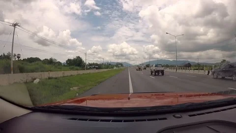 Road through the eyes of the driver of the red car Stock Footage 98274293
