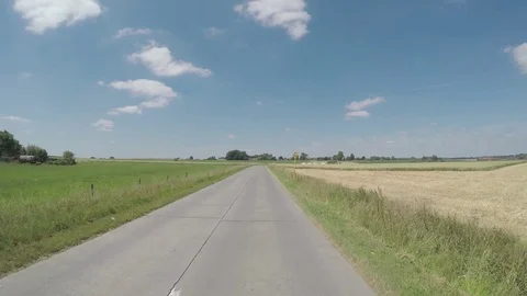 Road through the field Stock Footage 83499957