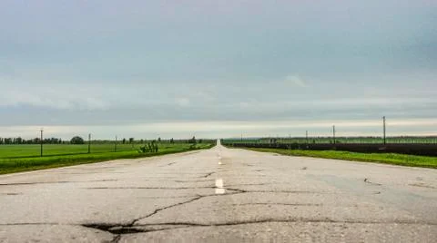 Road through the fields Stock Photos