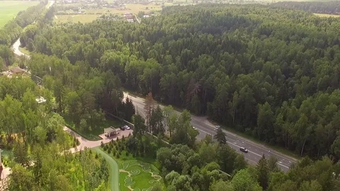 The road through the forest. Copter Shot. Stock Footage 70867097