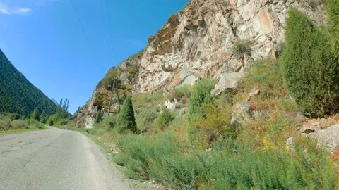 Road through the highlands by car Video stock 159473417