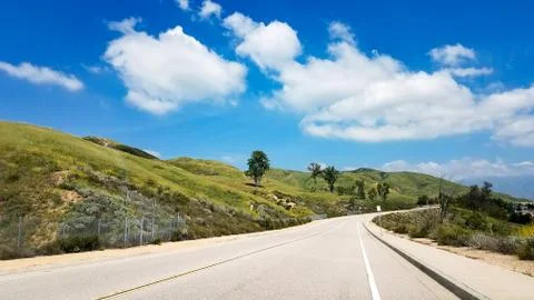 Road Through The Hills In Spring Stock Photos