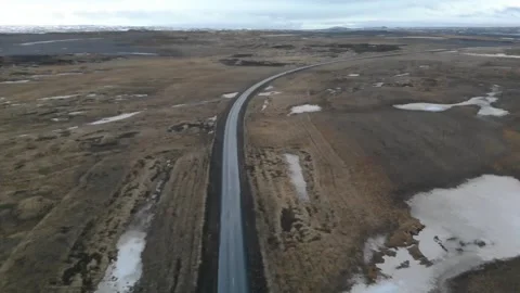 Road through the Icelandic landscape Stock Footage 232485803