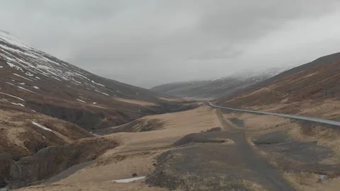 Road through the Icelandic landscape Stock Footage 232486281