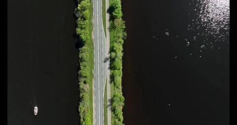 Road through a lake Stock Footage 322095104