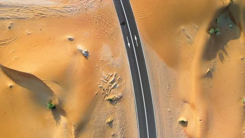 Road through Middle Eastern desert Video stock 101776379