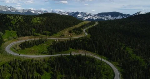 The road through the mountain pass. The road to the mountains. Mountain road.  Stock Footage 112812024