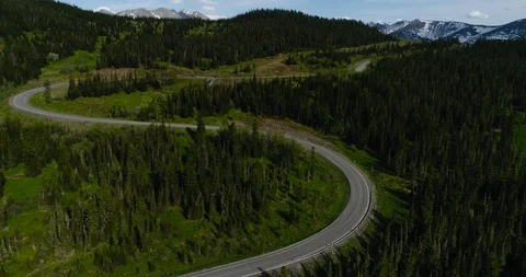 The road through the mountain pass. The road to the mountains. Mountain road.  Video stock 112812119