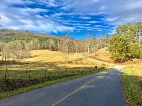 Road Through a Mountain Valley Stock Photos