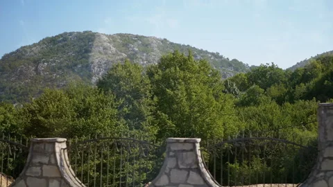 Road through mountainous terrain Stock Footage 293256698