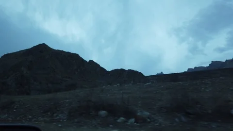 Road through the mountains of Elbrus View from the window of the car. 動画素材 100985634
