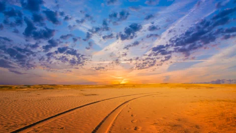 Road through the sandy desert  at the sunset Video stock 253983521