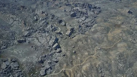 Road through the tract the fallen land of Zhigalgan in Kazakhstan Stock Footage 115846837