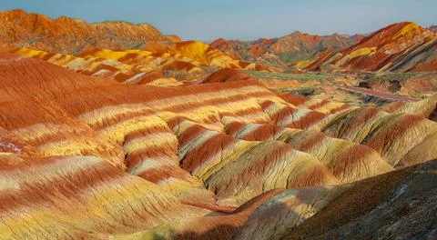 The road through the typical Danxia land form in Zhangye Danxia Park, China Stock Photos