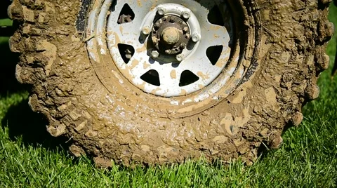Off road tire full of mud Stock-Footage 62564332