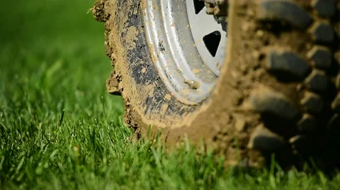 Off road tire full of mud Stockbeeldmateriaal 62564333