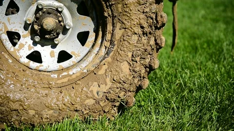 Off road tire full of mud Stock Footage 62564344