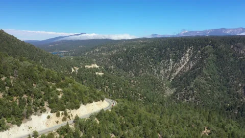 Road towards a lake Stock Footage 132909087