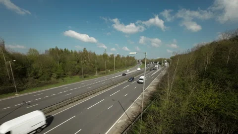 Road traffic on the A14 dual carriageway in Northamptonshire England. Stock Footage