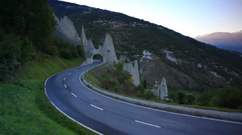 Road traffic and Eroded glacial rock formations Stock Footage 30397920
