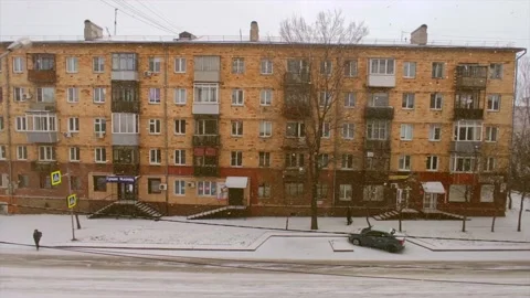 Road traffic and falling snow Stock Footage 221729779