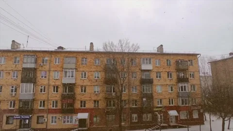 Road traffic and falling snow Stock Footage 221729984