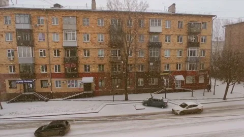 Road traffic and falling snow Stock Footage 221731047