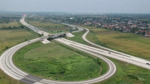 Road traffic around rice fields Video stock 200997771