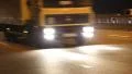 Road traffic on the bridge in nighttime (with stereo sound) HD Footage