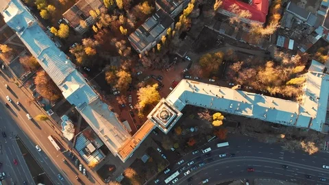 Road traffic on crossroad or intersection downtown of European city, aerial or Video stock 98836358